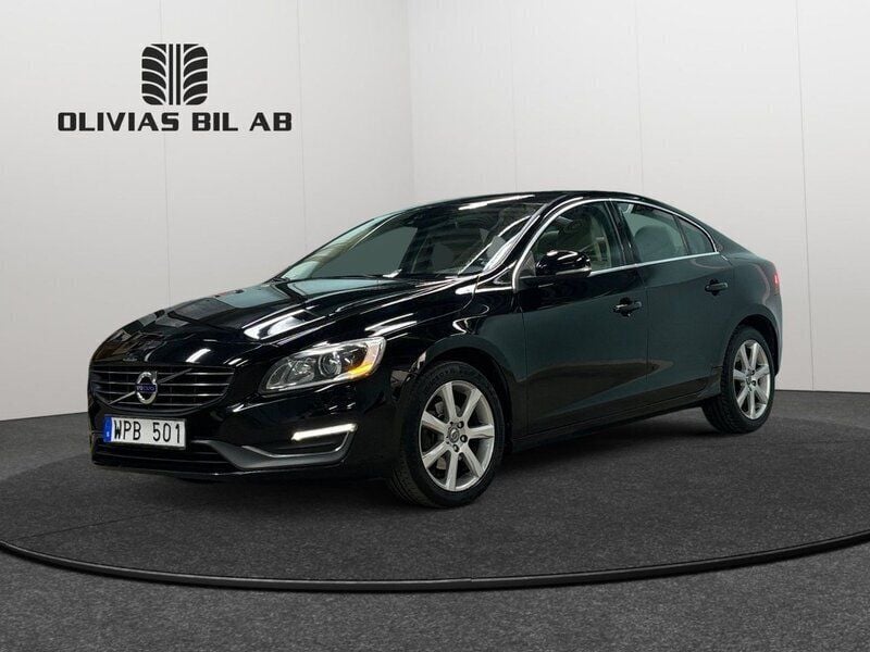 Svart Begagnad 2014 Volvo S60 Summum Sedan | 129 400 kr (Marknadspris) - Bild 1/4