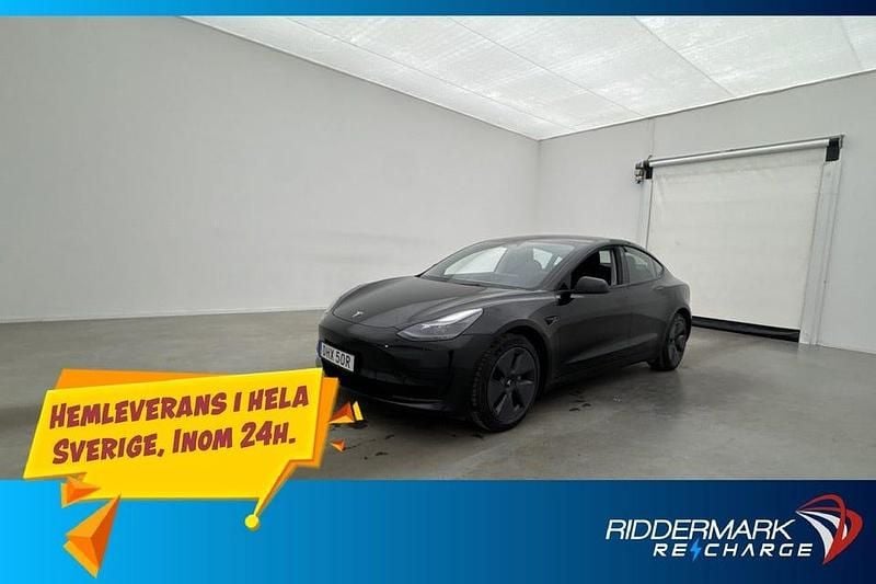 Svart Begagnad 2023 Tesla Model 3 Standard Range Sedan | 324 800 kr (Marknadspris) - Bild 1/3