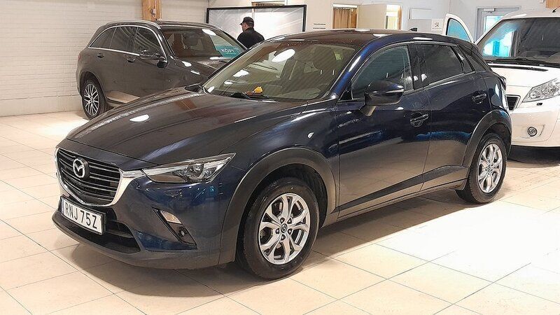 Blå (deep crystal blue metallic) Begagnad 2019 Mazda CX-3 Vision SUV | 209 900 kr (Marknadspris) - Bild 1/4