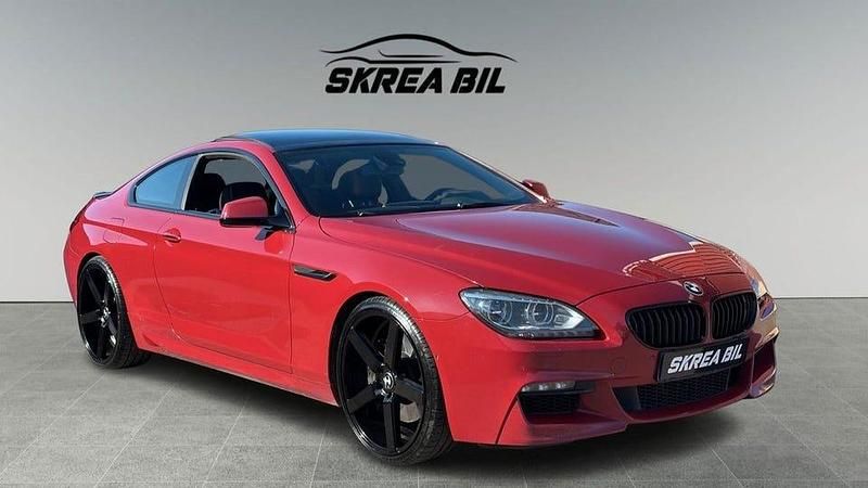 Röd metallic Begagnad 2012 BMW 650 M Sport Sportkupé | 229 900 kr - Bild 1/4