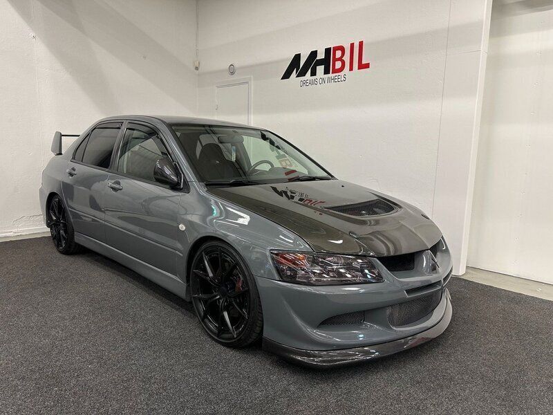 Blå Begagnad 2003 Mitsubishi Lancer Sedan | 349 900 kr - Bild 1/4