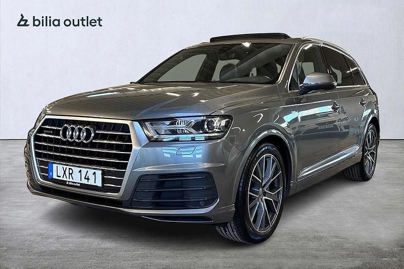 Grå Begagnad 2015 Audi Q7 S-Line SUV | 329 900 kr (Marknadspris) - Bild 1/3