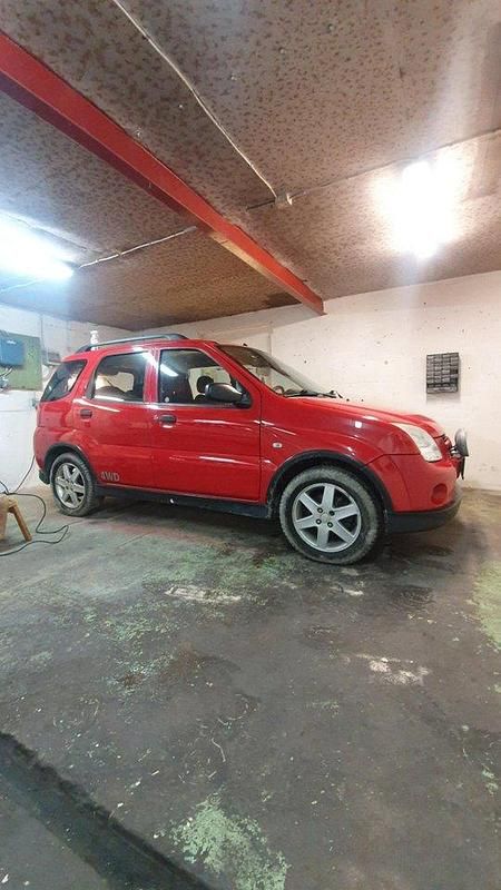 Röd Begagnad 2003 Suzuki Ignis Halvkombi | 23 000 kr - Bild 1/4
