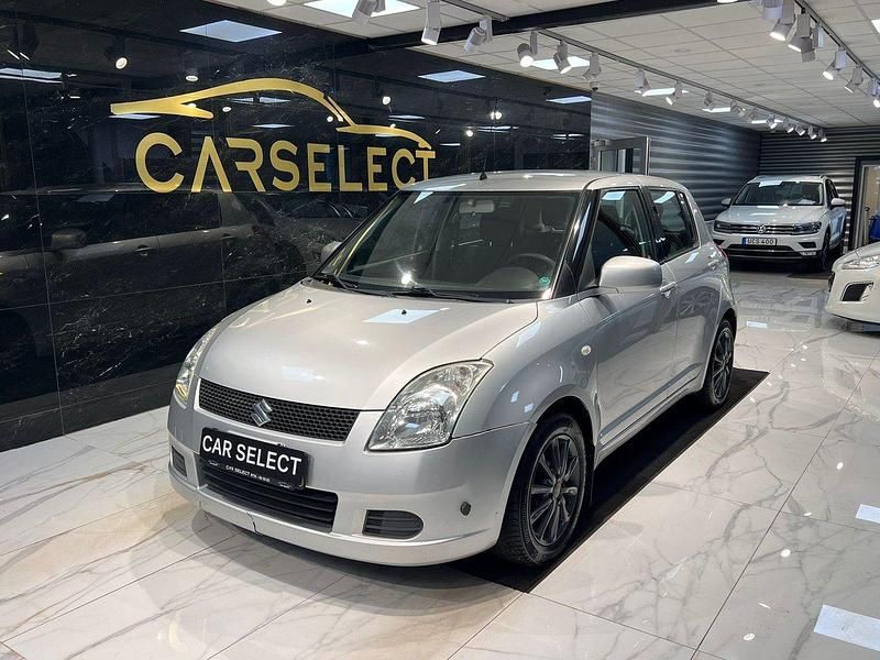Silver Begagnad 2005 Suzuki Swift Halvkombi | 29 900 kr (Marknadspris) - Bild 1/4