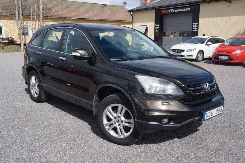Mörkbrun Begagnad 2010 Honda CR-V SUV | 119 900 kr (Lite dyr) - Bild 1/4