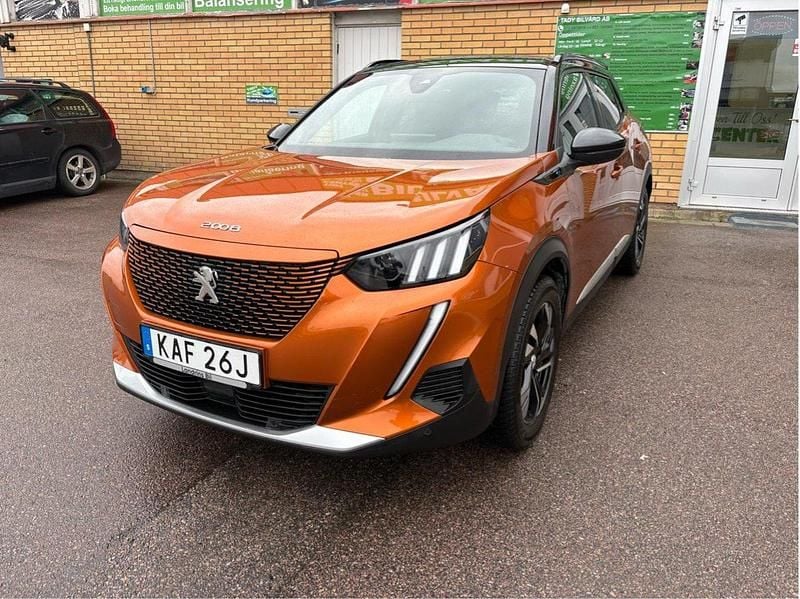 Orange Begagnad 2023 Peugeot e-2008 GTi SUV | 235 000 kr (Marknadspris) - Bild 1/4