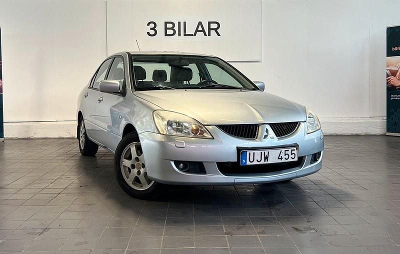 Silver Begagnad 2003 Mitsubishi Lancer Sedan | 18 990 kr (Marknadspris) - Bild 1/4