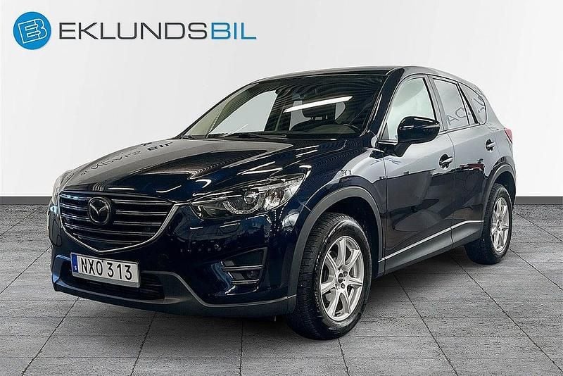 Deep crystal blue metallic Begagnad 2015 Mazda CX-5 Optimum SUV | 157 900 kr (Marknadspris) - Bild 1/4