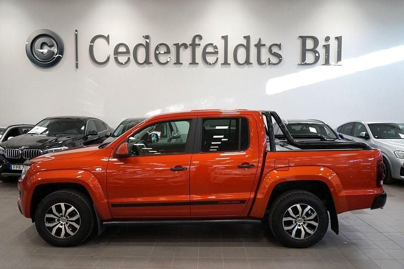 Ljusröd (röd) Begagnad 2014 VW Amarok Canyon Pickup | 228 800 kr (Marknadspris) - Bild 1/4