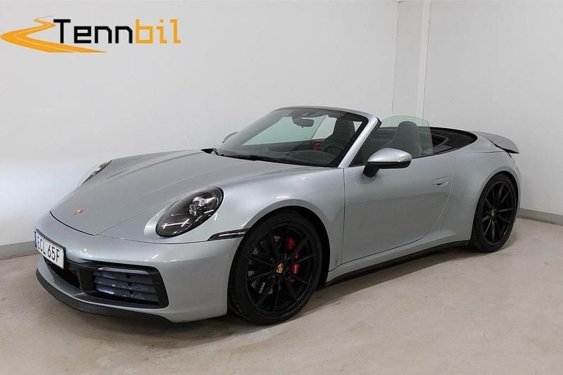 Flerfärgad (silver) Begagnad 2020 Porsche 911 Carrera S Cabriolet Chrono Cab | 1 249 900 kr - Bild 1/4