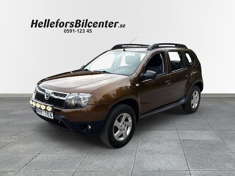 Brun Begagnad 2013 Dacia Duster SUV | 74 500 kr (Bra pris) - Bild 1/4