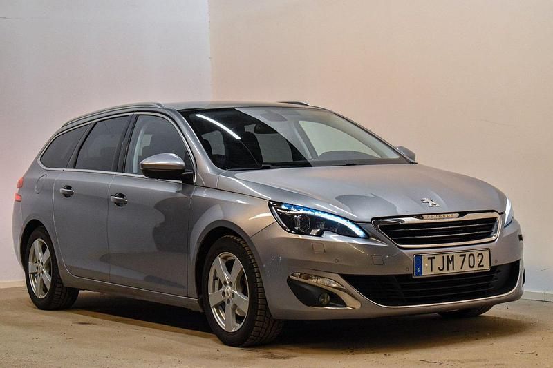 Grå Begagnad 2014 Peugeot 308 Allure Kombi | 79 800 kr (Marknadspris) - Bild 1/4