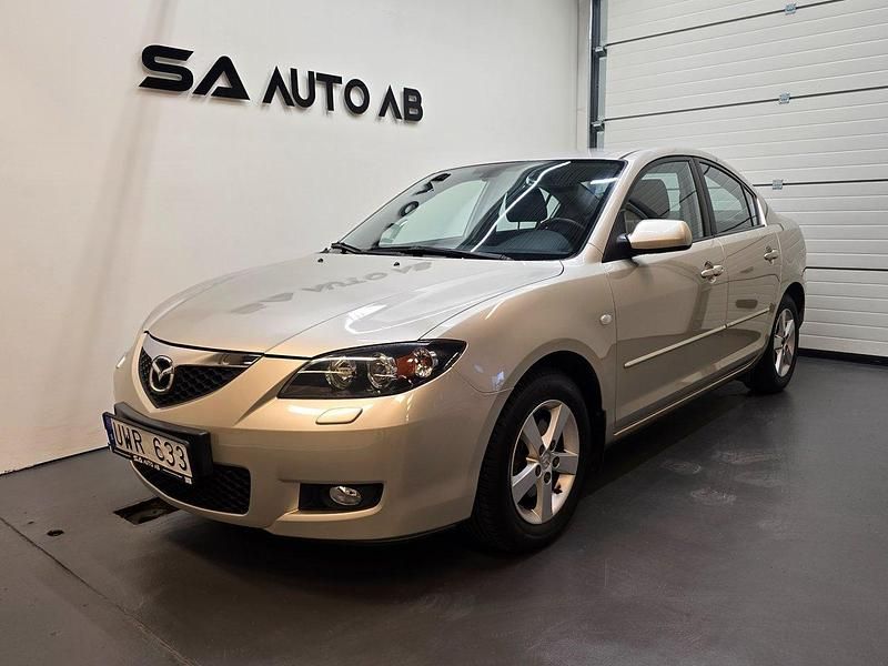 Grå Begagnad 2007 Mazda 3 Exclusive-Line Sedan | 59 900 kr (Dyr) - Bild 1/4