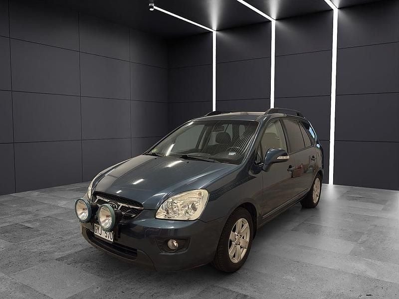 Begagnad Kia Carens 140 HK (102 kW) 2010 Blå Minibuss