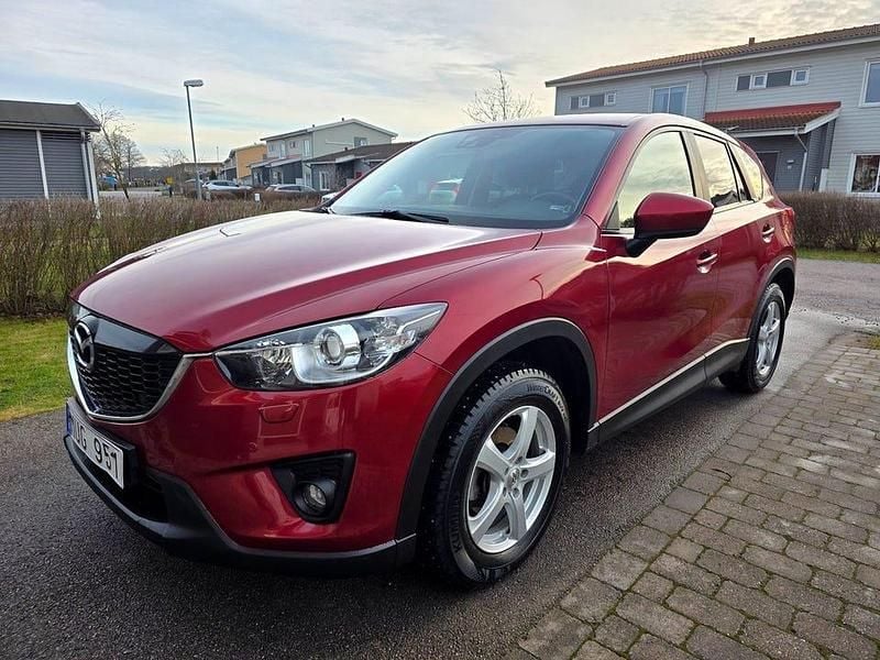 Vinrödmetallic Begagnad 2012 Mazda CX-5 SUV | 109 900 kr (Marknadspris) - Bild 1/4