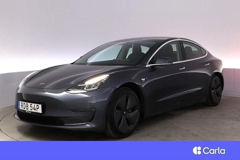 Grå Begagnad 2019 Tesla Model 3 Standard Range Plus Sedan | 244 900 kr (Lite dyr) - Bild 1/4