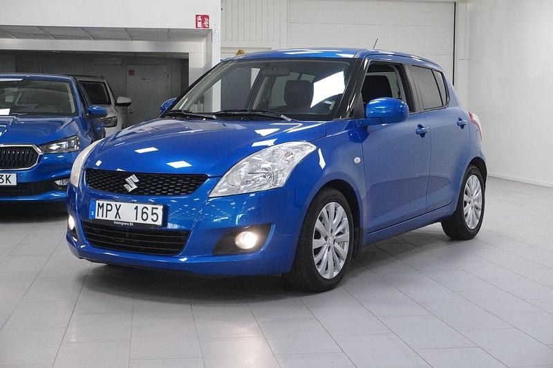 Blå Begagnad 2010 Suzuki Swift Halvkombi | 74 900 kr (Marknadspris) - Bild 1/4