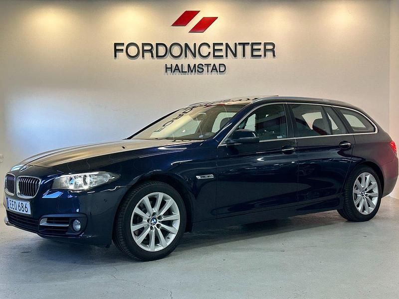 Blå Begagnad 2014 BMW 520 Kombi | 179 800 kr (Marknadspris) - Bild 1/4
