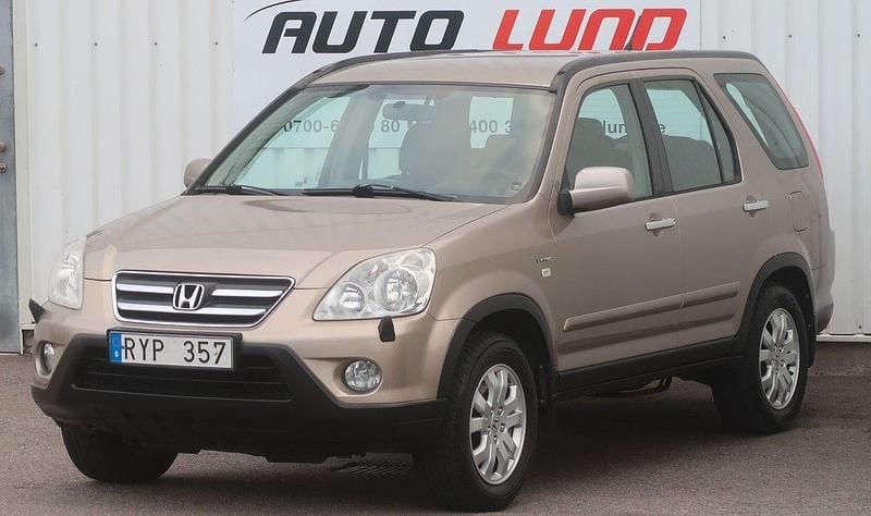 Ljusbrun (brunmetallic) Begagnad 2006 Honda CR-V SUV | 33 000 kr - Bild 1/4