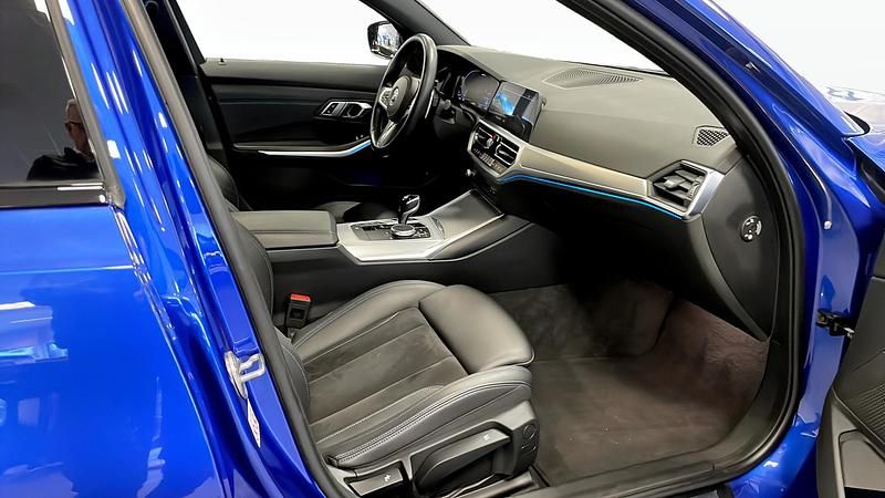 Begagnad BMW 330e Shadowline 2022 Blå Kombi