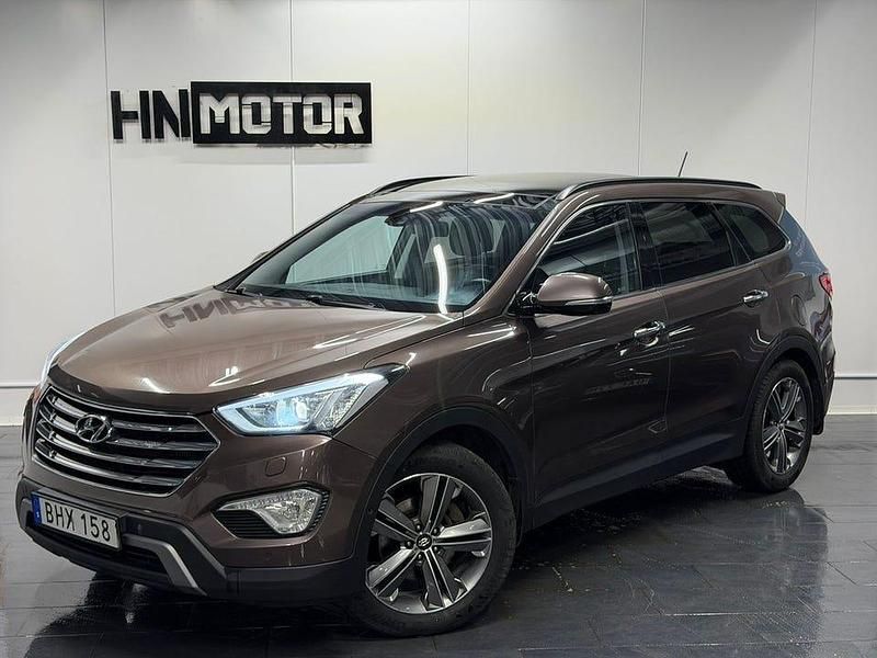 Brun Begagnad 2014 Hyundai Grand Santa Fe SUV | 149 900 kr (Marknadspris) - Bild 1/4