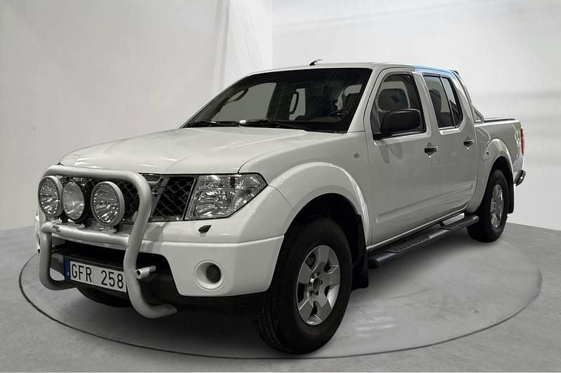 Vit Begagnad 2006 Nissan Navara Pickup | 100 000 kr (Marknadspris) - Bild 1/4