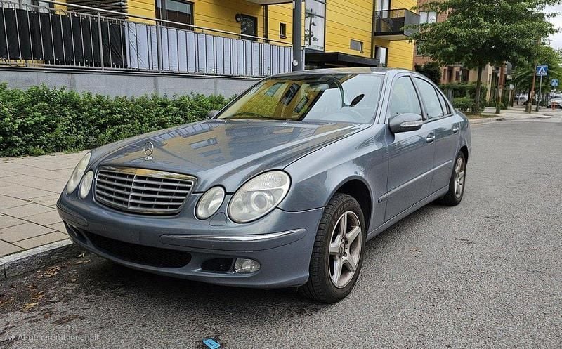 Grå Begagnad 2005 Mercedes E200 Sedan | 55 000 kr (Marknadspris) - Bild 1/4
