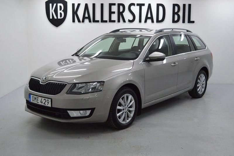 Ljusbrun (brun) Begagnad 2014 Skoda Octavia Ambition Kombi | 79 900 kr (Marknadspris) - Bild 1/4