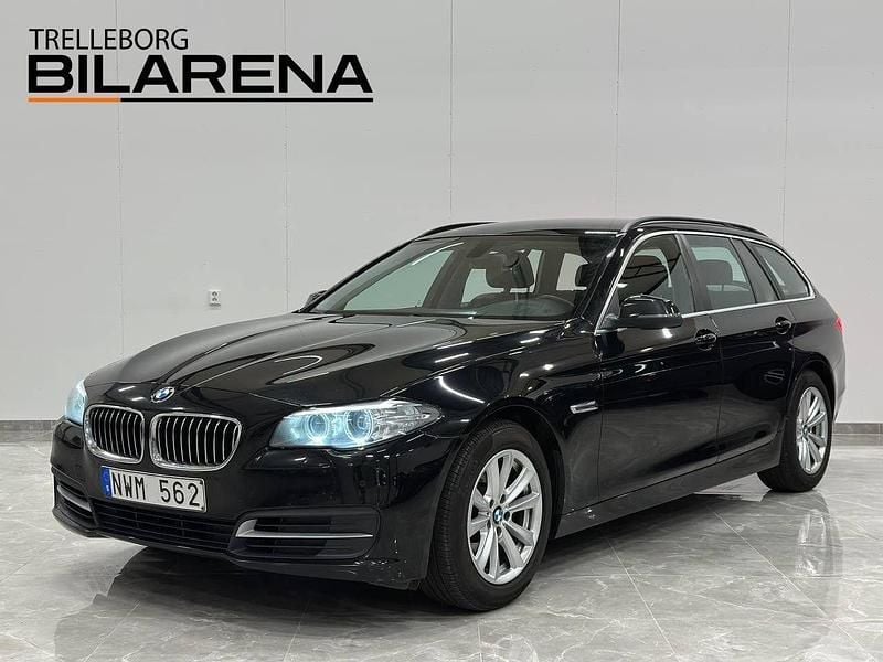 Svart Begagnad 2014 BMW 520 Kombi | 149 900 kr (Marknadspris) - Bild 1/4