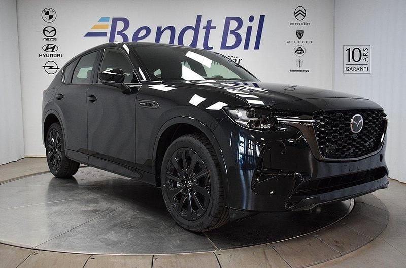 Svart Ny 2025 Mazda CX-60 Homura-Line SUV | 589 500 kr (Marknadspris) - Bild 1/3