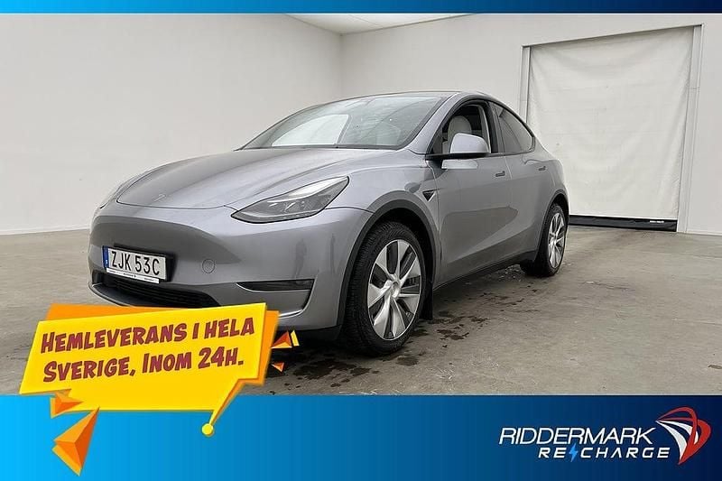 Grå Begagnad 2023 Tesla Model Y Long Range AWD SUV | 399 800 kr (Marknadspris) - Bild 1/3