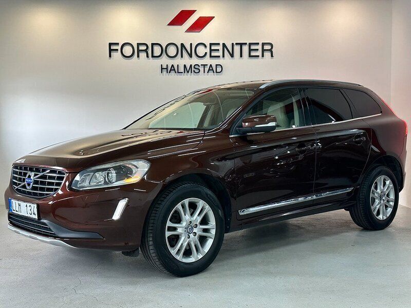 Mörkbrun (brun) Begagnad 2013 Volvo XC60 Summum SUV | 168 900 kr (Marknadspris) - Bild 1/4