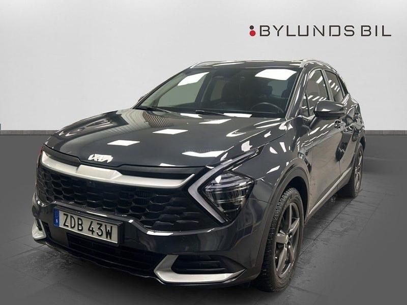 Grå Begagnad 2023 Kia Sportage Advance SUV | 339 000 kr (Marknadspris) - Bild 1/4