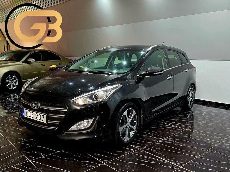 Svart Begagnad 2015 Hyundai i30 Kombi | 109 900 kr (Marknadspris) - Bild 1/4