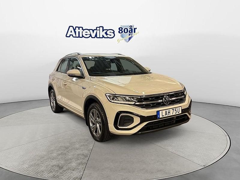 Grå Begagnad 2024 VW T-Roc R-line SUV | 379 900 kr (Lite dyr) - Bild 1/4