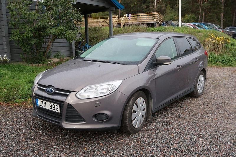 Brun Begagnad 2013 Ford Focus Trend Kombi | 38 500 kr (Bra pris) - Bild 1/4
