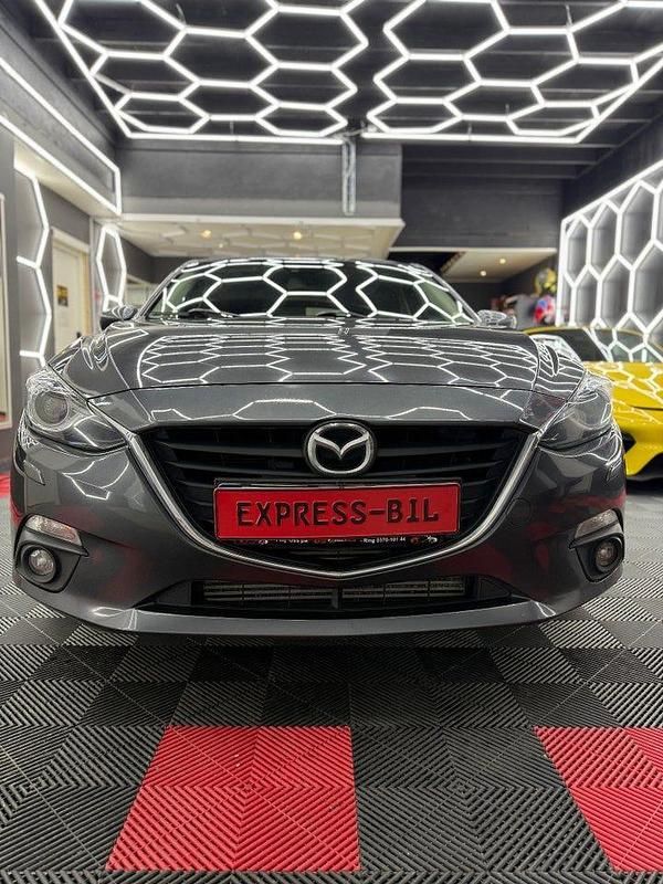 Grå Begagnad 2013 Mazda 3 Inclusive | 68 900 kr (Marknadspris) - Bild 1/4
