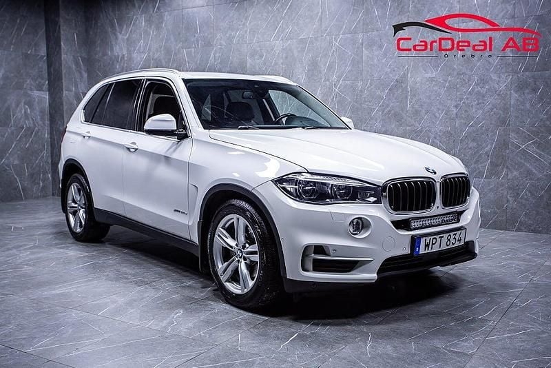 Vit Begagnad 2014 BMW X5 SUV | 259 800 kr (Marknadspris) - Bild 1/4