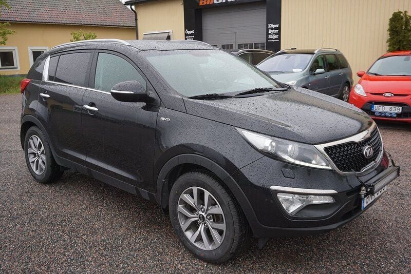 Svart Begagnad 2014 Kia Sportage Comfort SUV | 99 900 kr (Marknadspris) - Bild 1/4