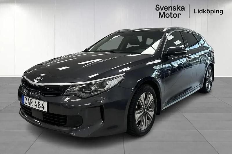 Grå Begagnad 2017 Kia Optima Hybrid 2 Sedan | 189 000 kr (Marknadspris) - Bild 1/4