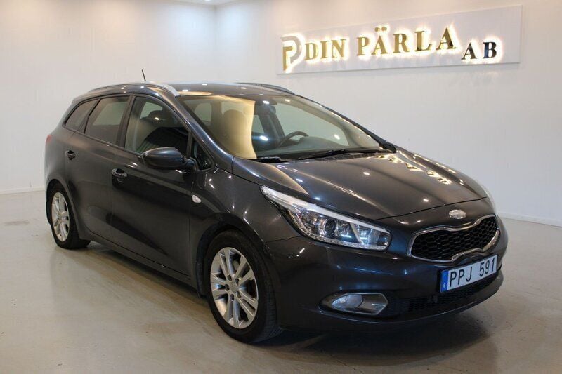Grå Begagnad 2014 Kia Ceed Sportswagon EX Kombi | 59 900 kr (Marknadspris) - Bild 1/4