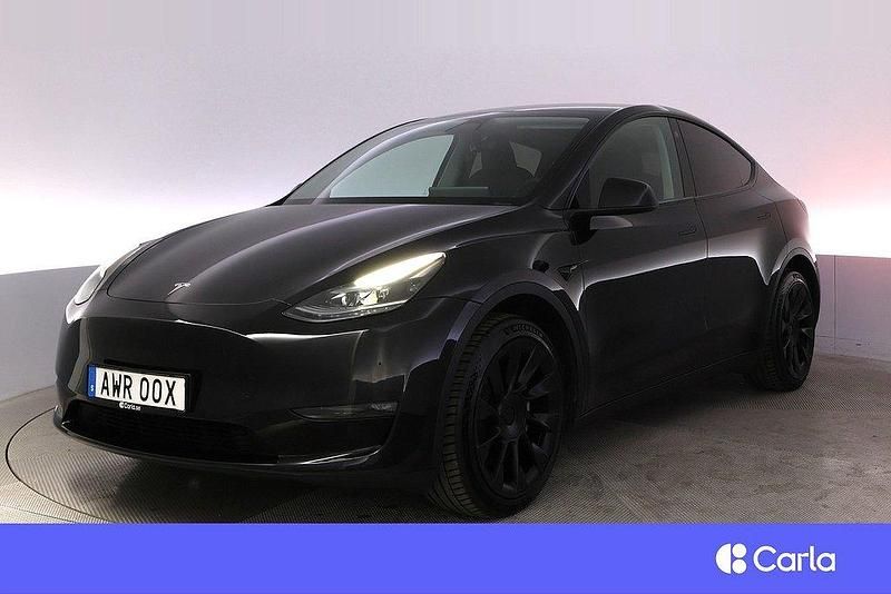 Svart Begagnad 2023 Tesla Model Y Long Range SUV | 456 900 kr - Bild 1/4