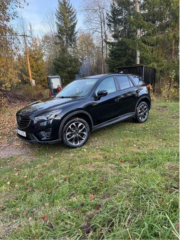 Svart Begagnad 2015 Mazda CX-5 SUV | 115 000 kr (Marknadspris) - Bild 1/4