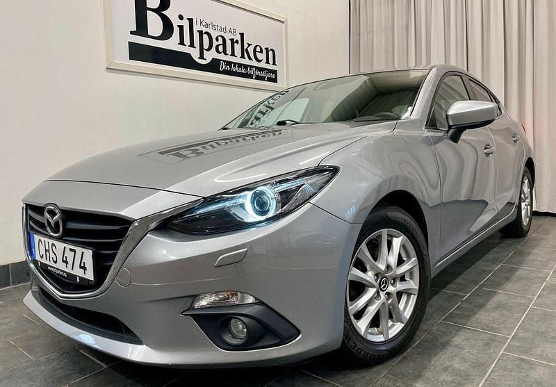 Grå Begagnad 2014 Mazda 3 Inclusive Halvkombi | 119 900 kr (Marknadspris) - Bild 1/3
