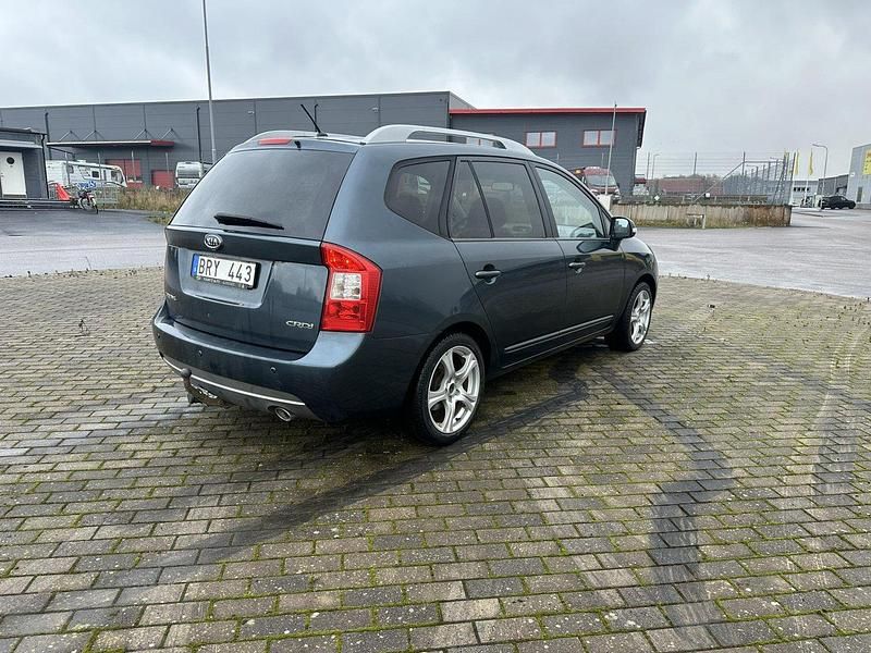 Blå Begagnad 2012 Kia Carens Minibuss | 35 000 kr - Bild 1/4