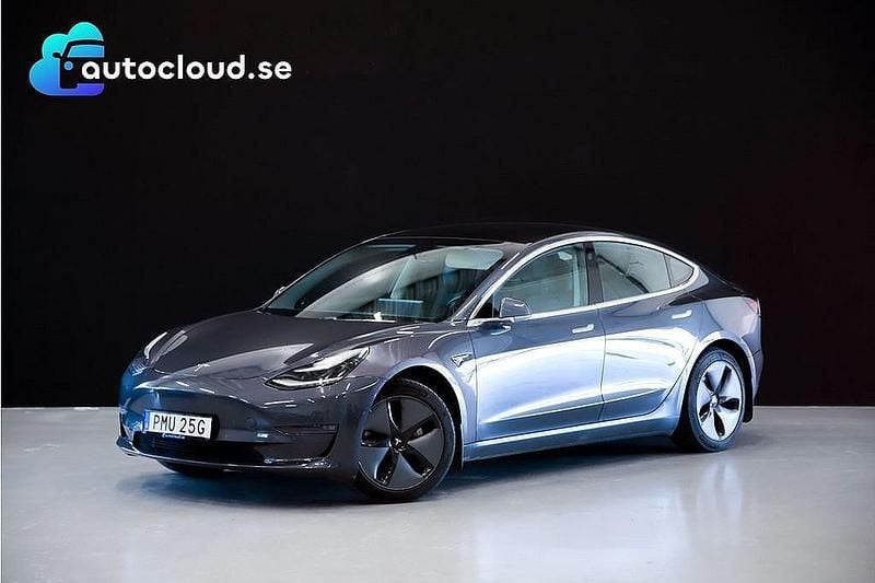 Grå Begagnad 2019 Tesla Model 3 Standard Range Plus Sedan | 259 800 kr (Lite dyr) - Bild 1/4