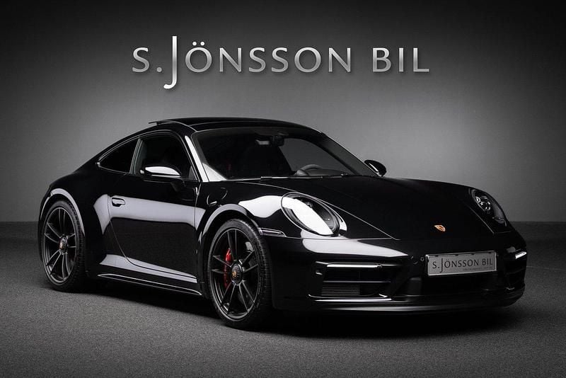 Svart Begagnad 2023 Porsche 911 Carrera GTS Sportkupé | 1 645 000 kr (Marknadspris) - Bild 1/4