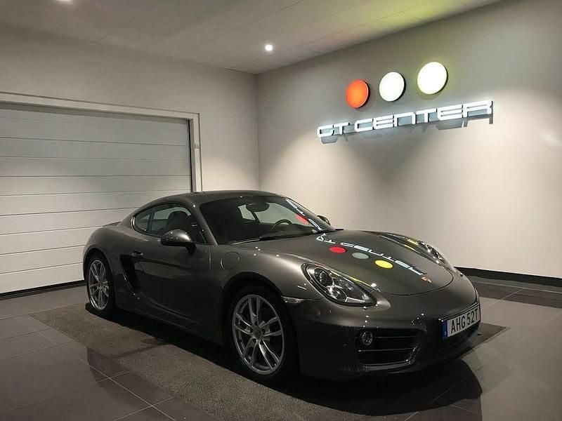 Begagnad Porsche Cayman 275 HK (202 kW) 2013 Agate grey metallic/svart läder Sportkupé