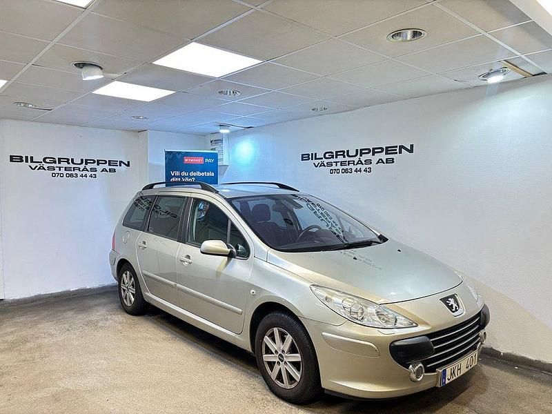 Grå Begagnad 2007 Peugeot 307 Kombi | 29 900 kr (Marknadspris) - Bild 1/4
