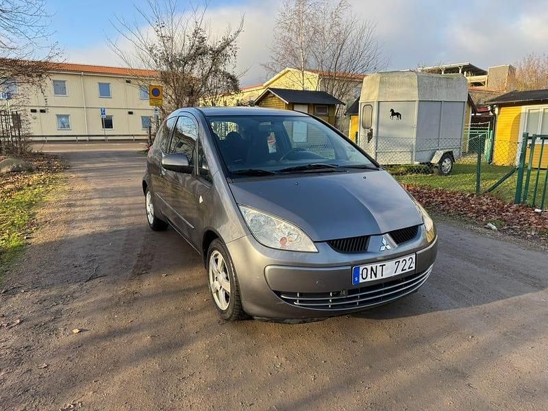 Begagnad Mitsubishi Colt 95 HK (69 kW) 2007 Grå Halvkombi